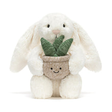 Cargar imagen en el visor de la galería, Conejo crema con planta / Cream Bunny with Plant Jellycat 31x12x9 cm
